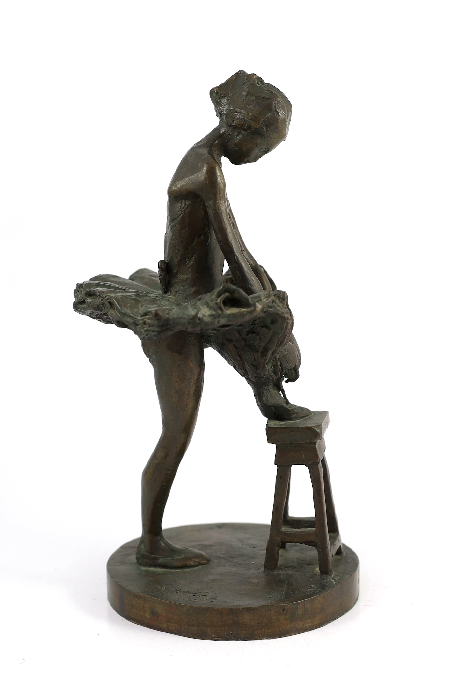 Sidney Beck (SA, b.1936). A limited edition bronze figure of a ballerina tying her shoe, 17cm wide, 36cm high